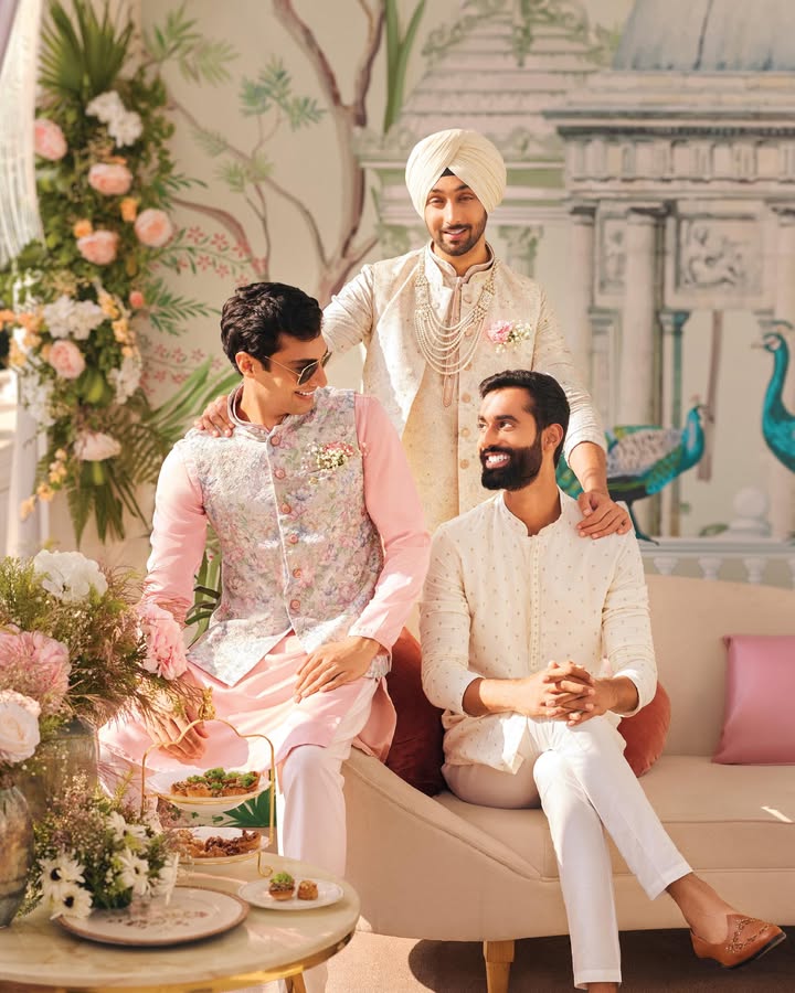 The groomsmen dressed in the serene hues of the Aranya Collection that redefine wedding style