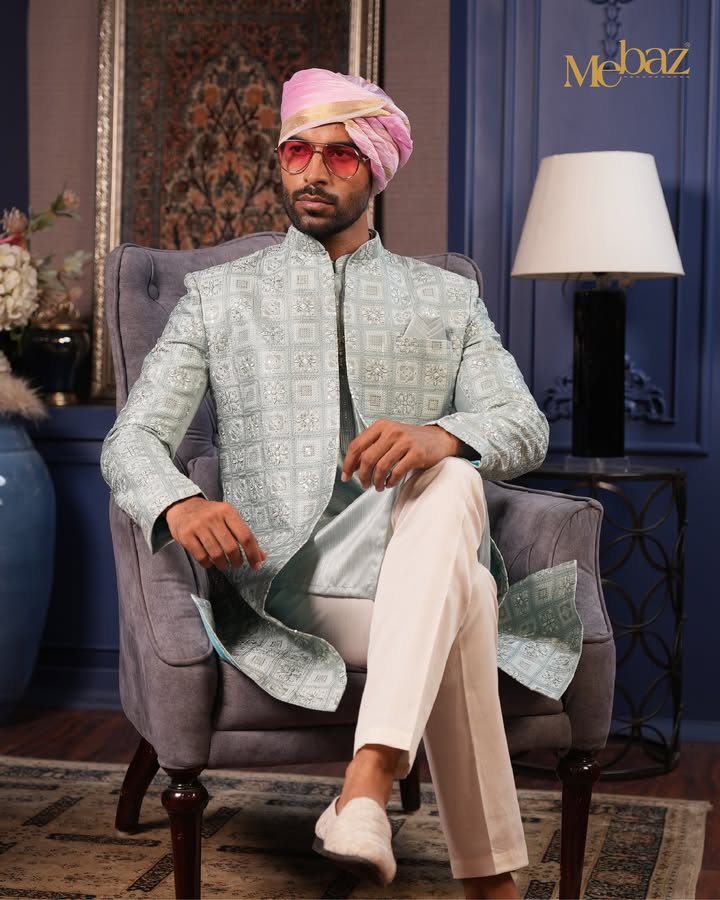 Elevate your celebration style with this stunning mint green sherwani, where tradition meets modern charm