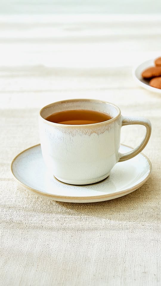 Coffee in your hands. Rain on your window. And a mug that feels like home
