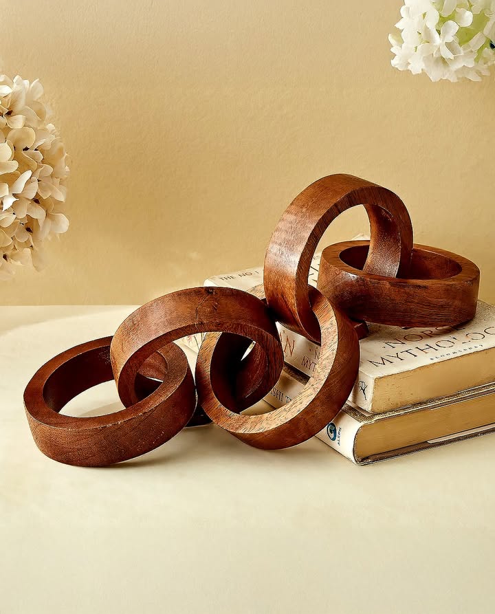 Add elegance to your space with this classic chain link accent. Homecentre HomecentreIndia TableAccent Wood Classic