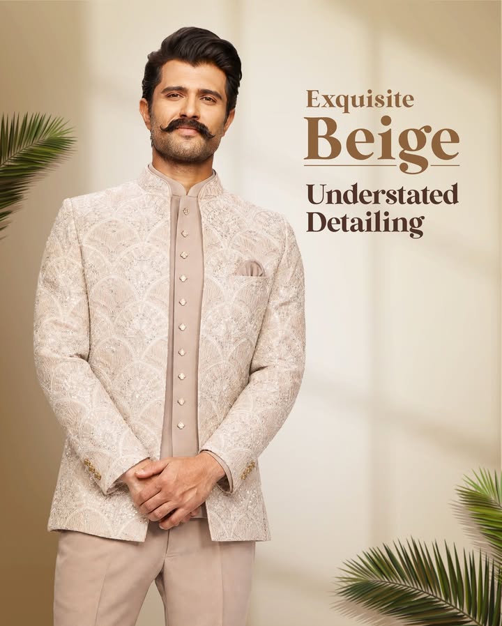 A warm beige base elevated with intricate embroidery and a clean open front silhouette