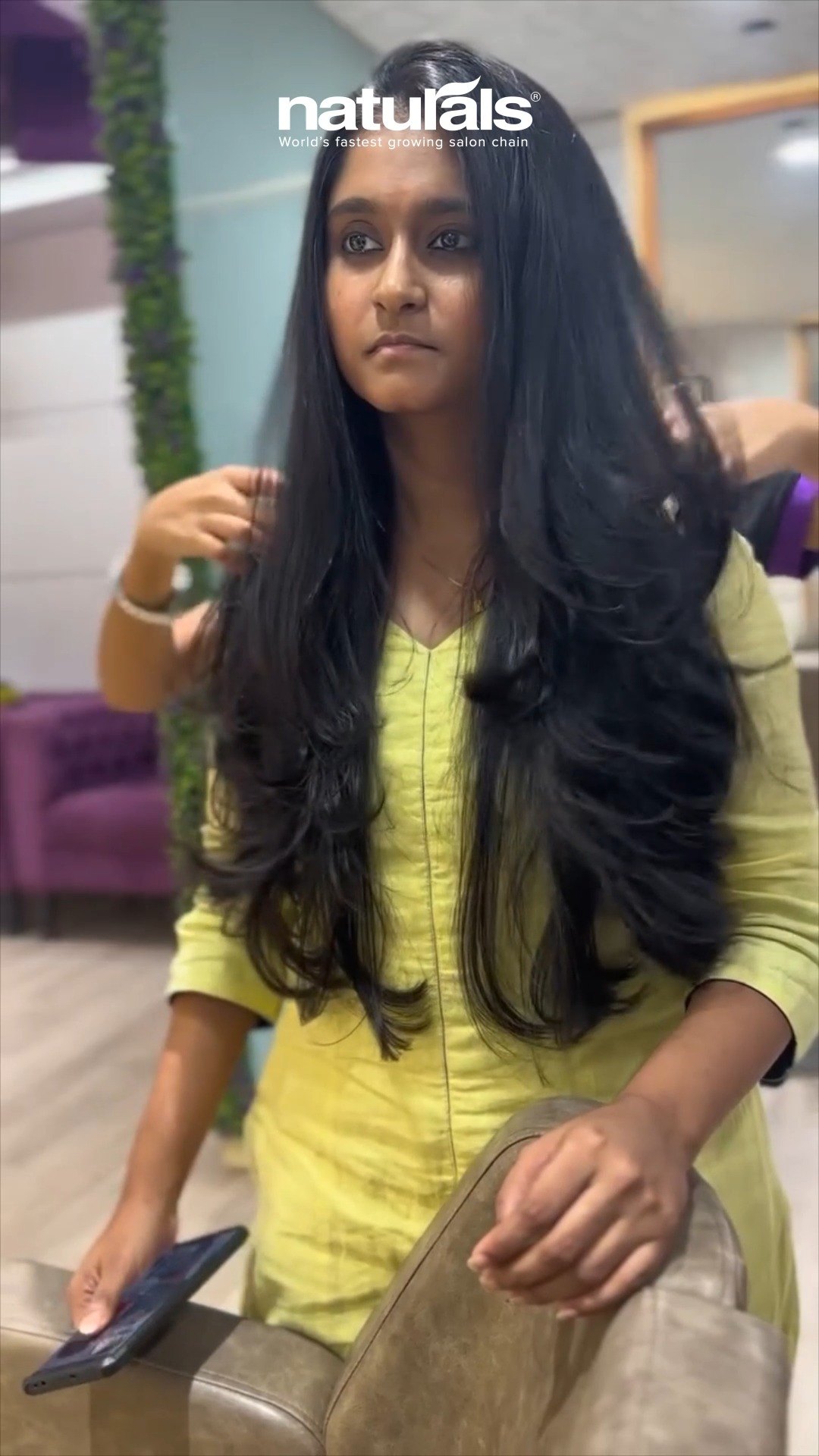 Snip by snip, the layers fall into place framing the face, adding bounce, and turning up the volume