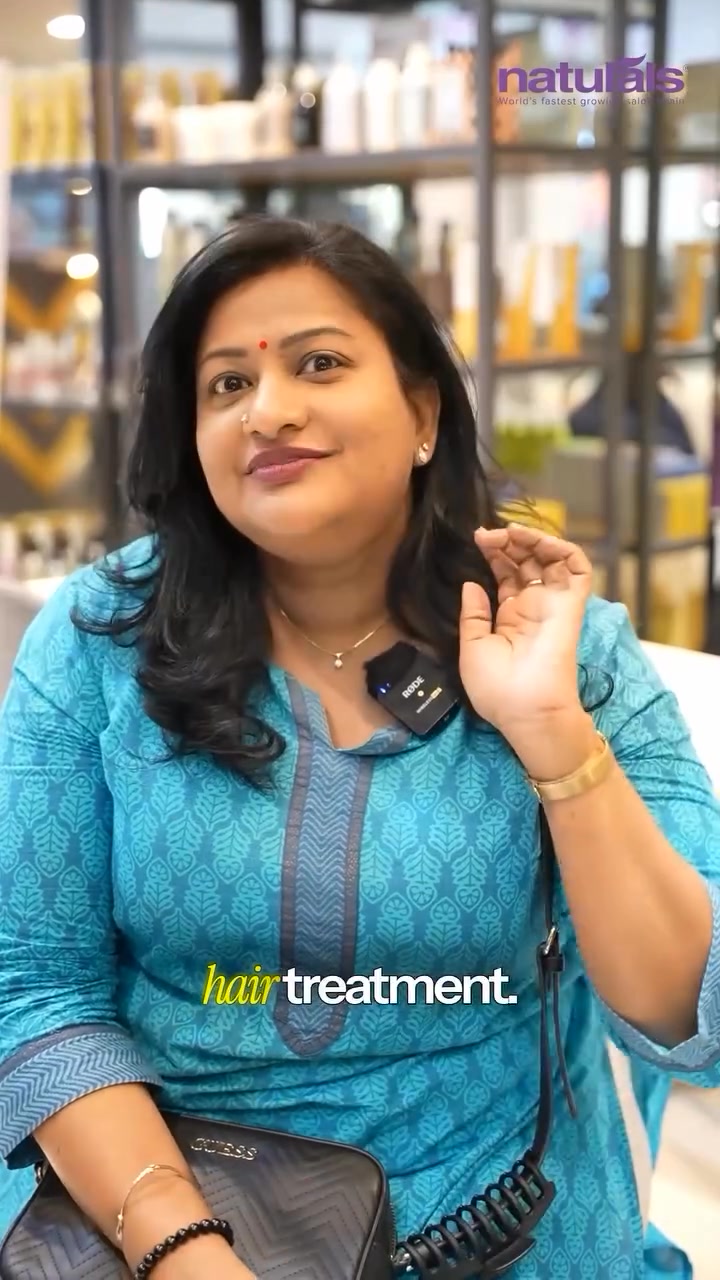  Her smile says it all A happy customer enjoying the benefits of our Customer First Plan at Naturals Salon