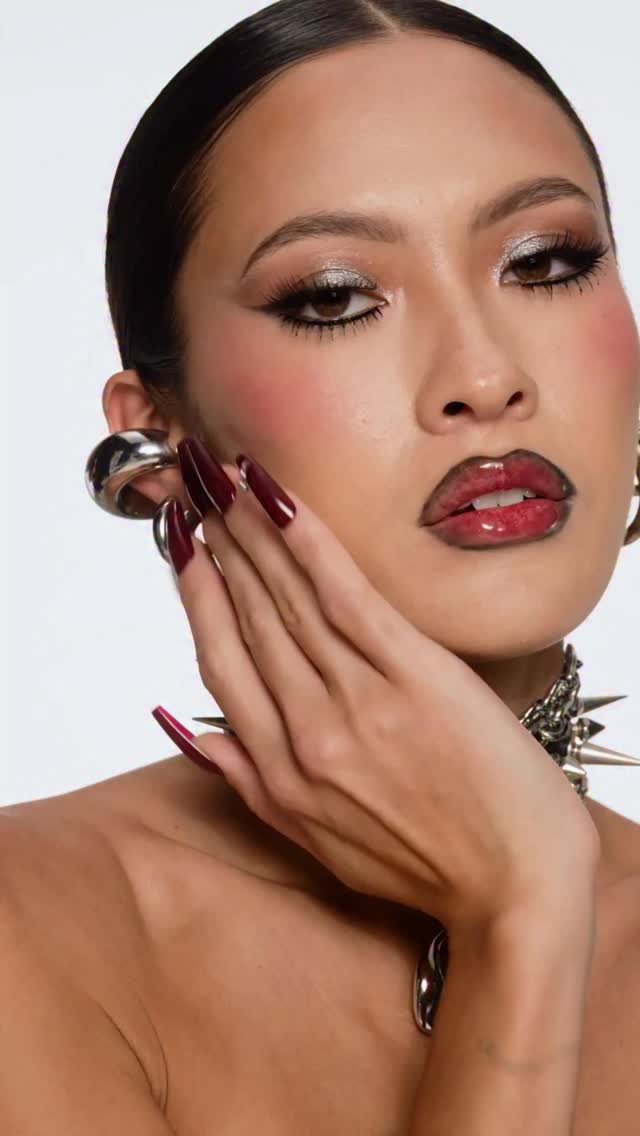 Hot meets goth with this moody, vamped up look that pairs blood red Ruby Woo lips with mod inspired eye makeup MAC MUA...