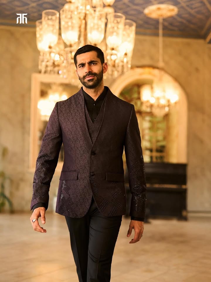 As he walks down the hallway, it feels like a runway, shadows and reflections tracing the boldness in his steps
