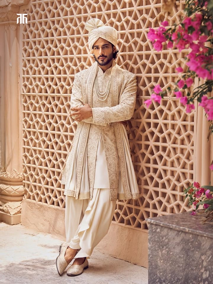 Crafted for the man who values both comfort and style, this ivory ensemble balances lightness with luxury