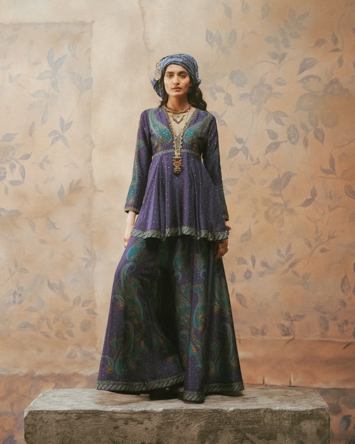 A celebration of movement, rhythm, and heritage this silhouette features interconnected paisley designs that flow seamlessl...