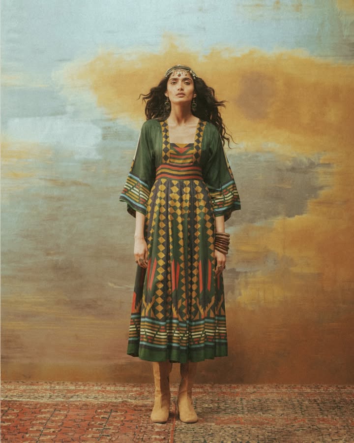 Printed with abstract geometric patterns in vivid colors, this long dress is crafted in dupion