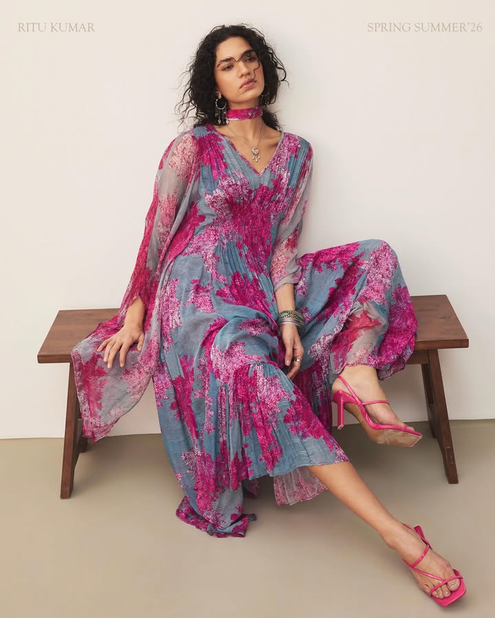 Defined by lightness and ease, the purple Khizan kaftan comes alive with signature Ritu Kumar prints.