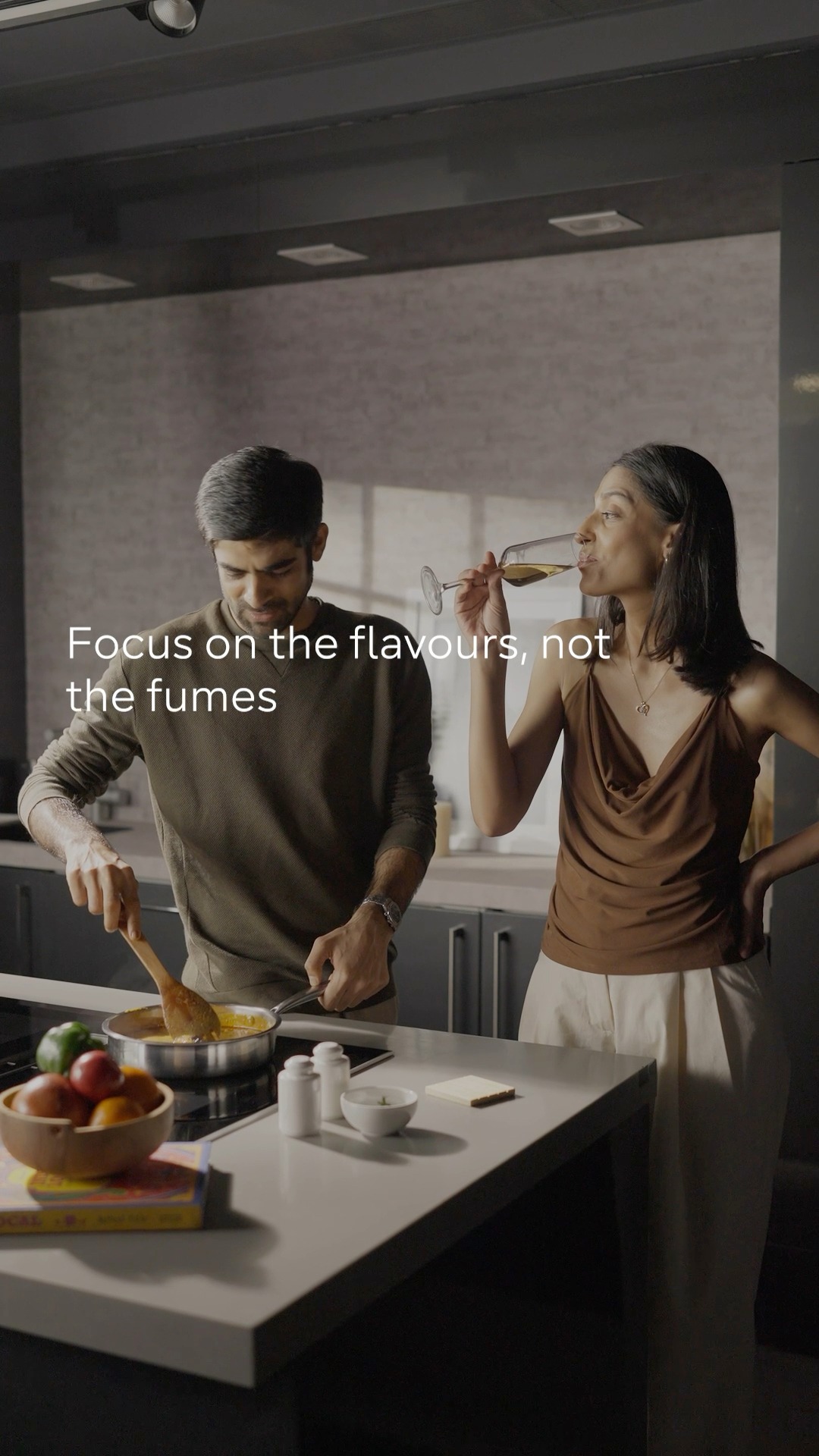 Steam swirls up, then disappears drawn in instantly and silently by the Siemens venting cooktop. No overhead hood