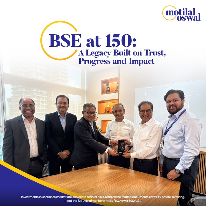 Mr. Sundararaman Ramamurthy, MD CEO of BSE, presents the 150 commemorative coin to Mr. Motilal Oswal, Mr. Raamdeo Agrawal, and Mr Mr. Sundararaman Ramamurthy, MD CEO of BSE, presents the 150 commemorative coin to Mr. Motilal Oswal, Mr