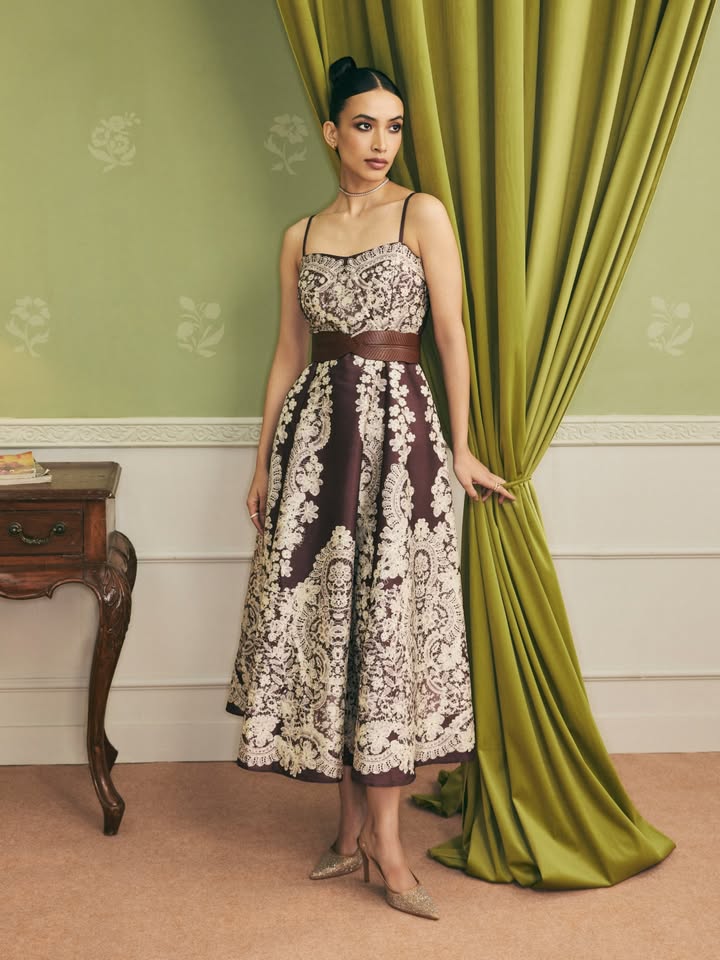 This mocha hued dress is a warm sight on cold winter nights. Shop now, online and in store