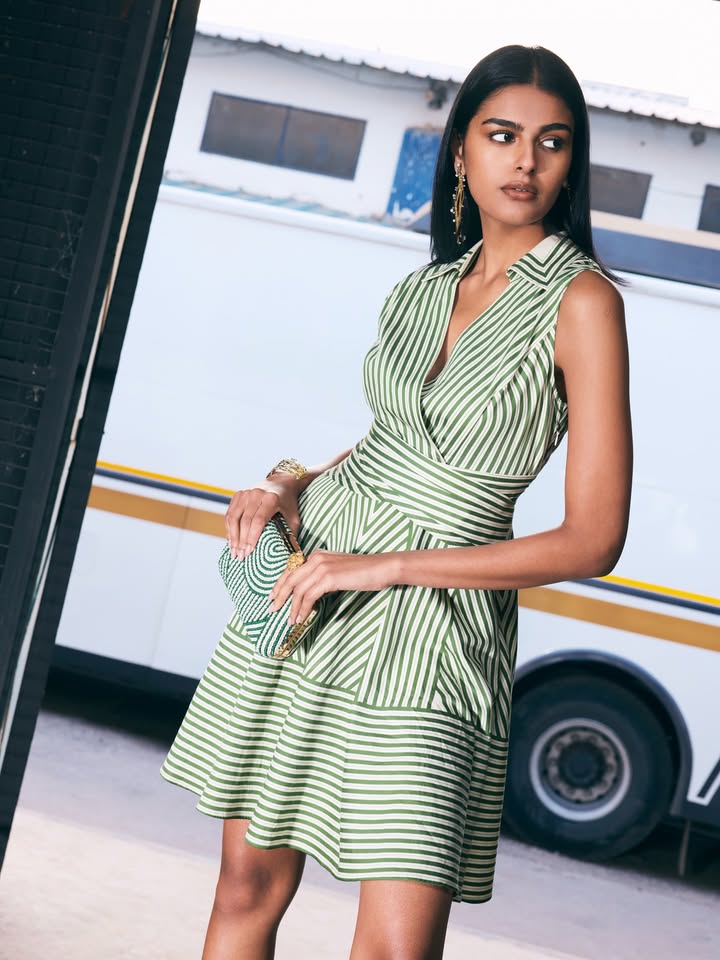 Architectural stripes meet an easy summer silhouette tailored through the bodice, softened with movement through the hem...