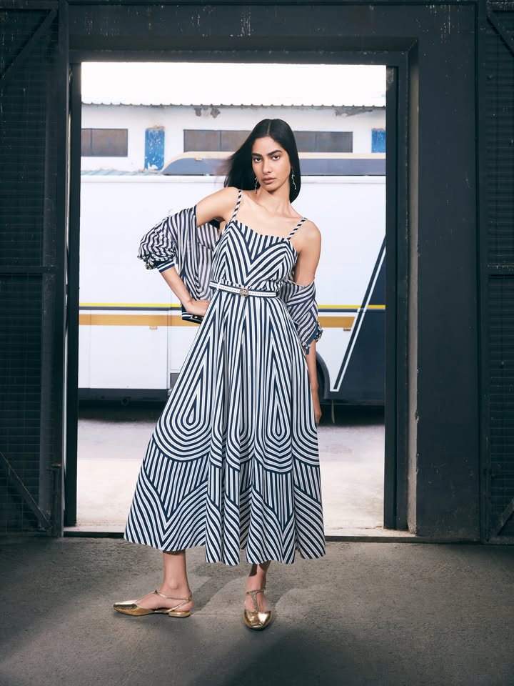The Merilyn Long Dress combines clean lines, graphic stripes and an easy elegance that never tries too hard