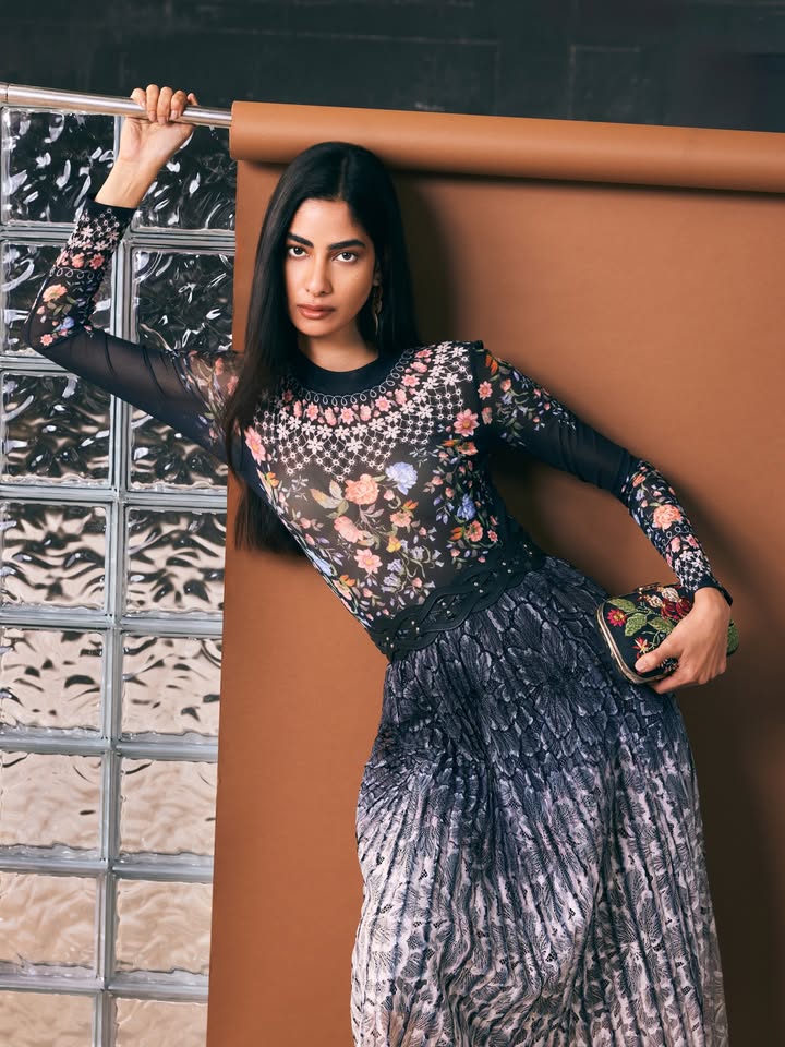 A scatter of blooms, a sweep of pleats and nowhere particular to be, except beautifully dressed