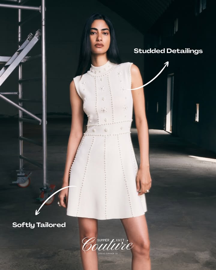 Tailored lines meet delicate studded detailing, creating a silhouette that feels both refined and modern