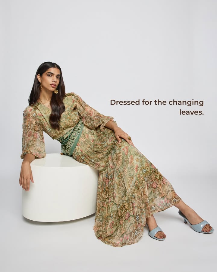 Deep green, fluid chiffon and a print made for the transition season. Shop the Sera long dress via the link in our bio