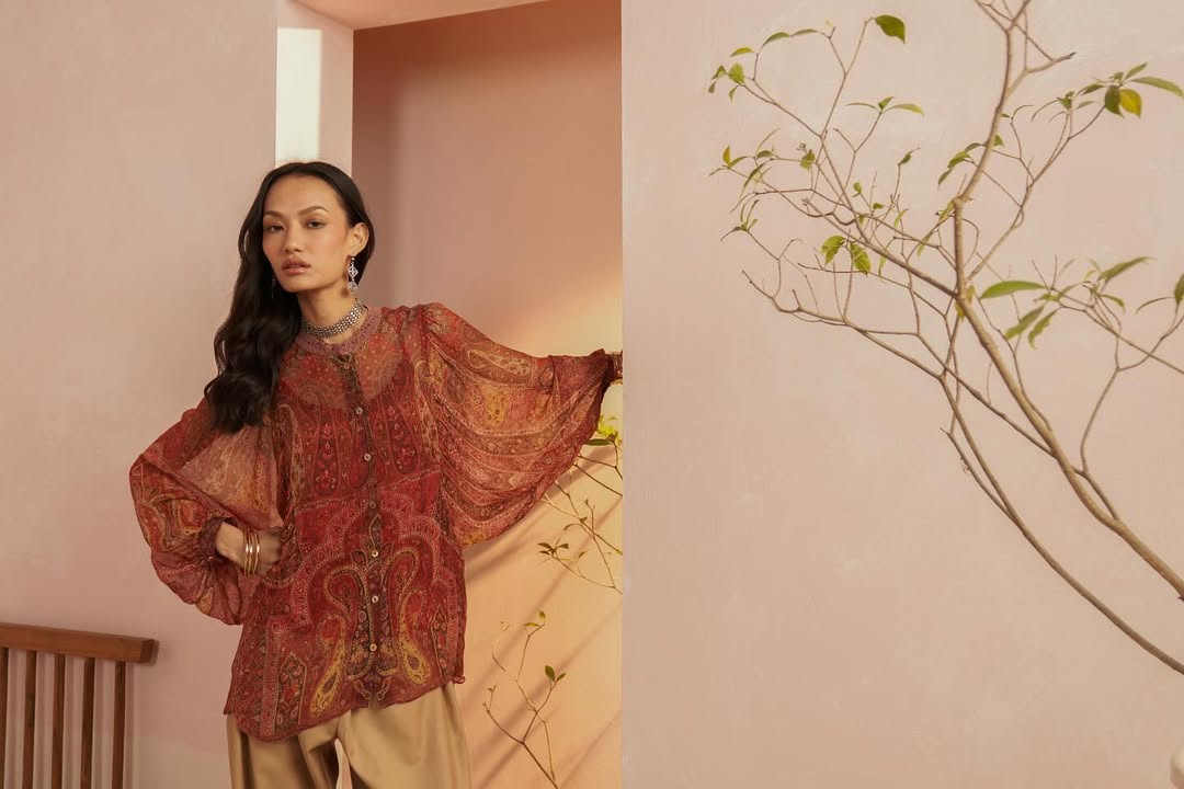 Crafted with intricate prints and vibrant tones, this shirt is equal parts ease and elegance perfect for sun drenched stro...