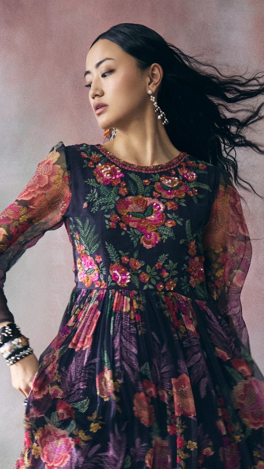 Dresses in striking prints and vibrant colours, , designed to move comfortably through the day