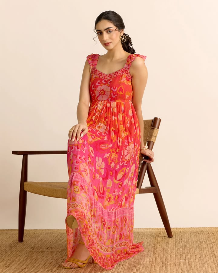 Printed chiffon with delicate ruffle detailing. Summer dressing, the Aarke way. AarkeSS26 AarkeNewCollection