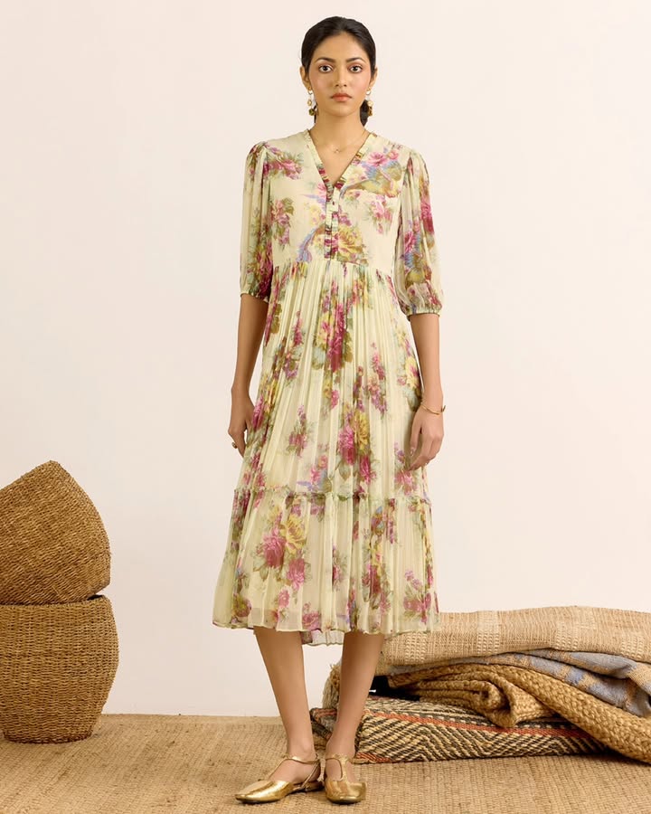 A flowing silhouette with soft floral prints, made for warm summer days AarkeSS26 AarkeNewCollection