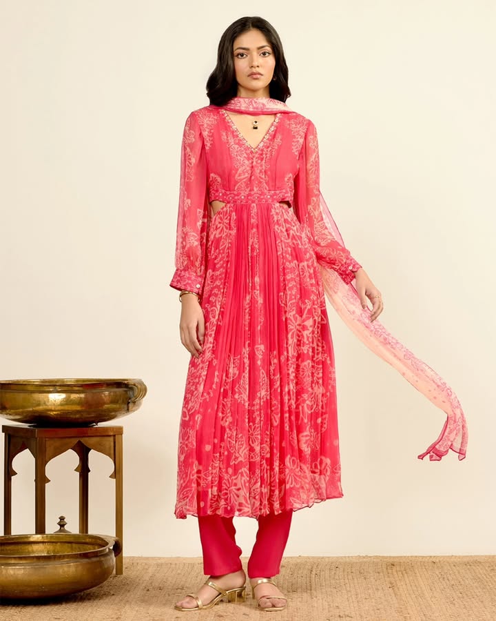 Batik inspired prints meet a fluid silhouette, detailed with subtle embroidery