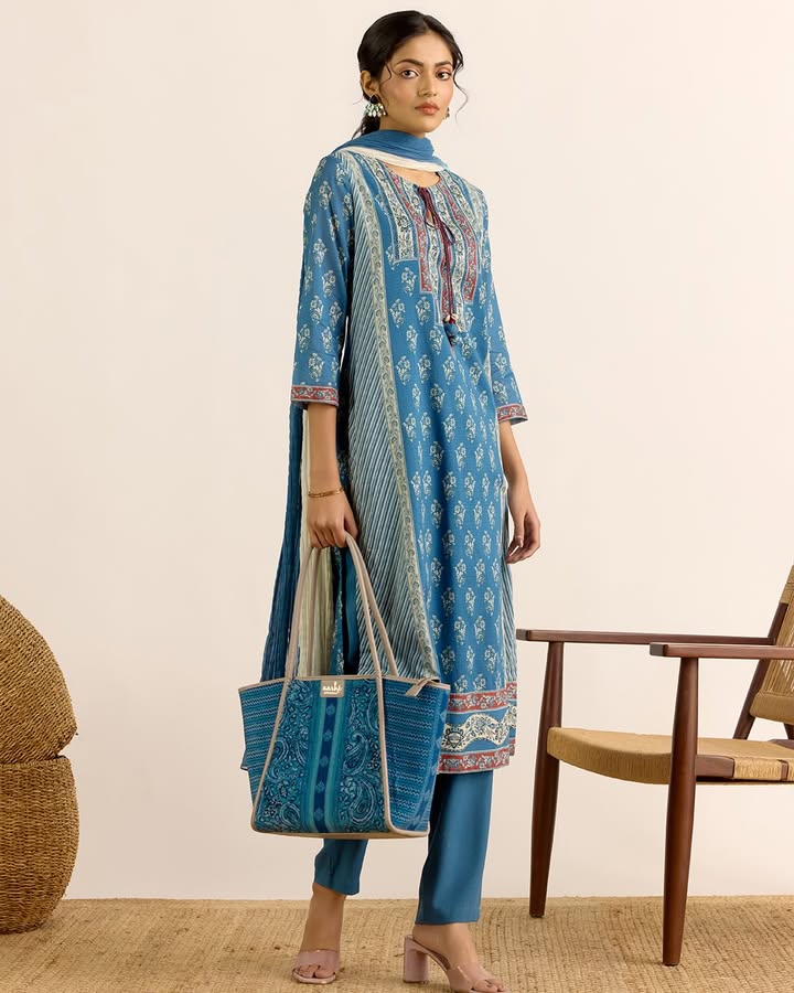 Soft prints meet effortless elegance in this blue suit set