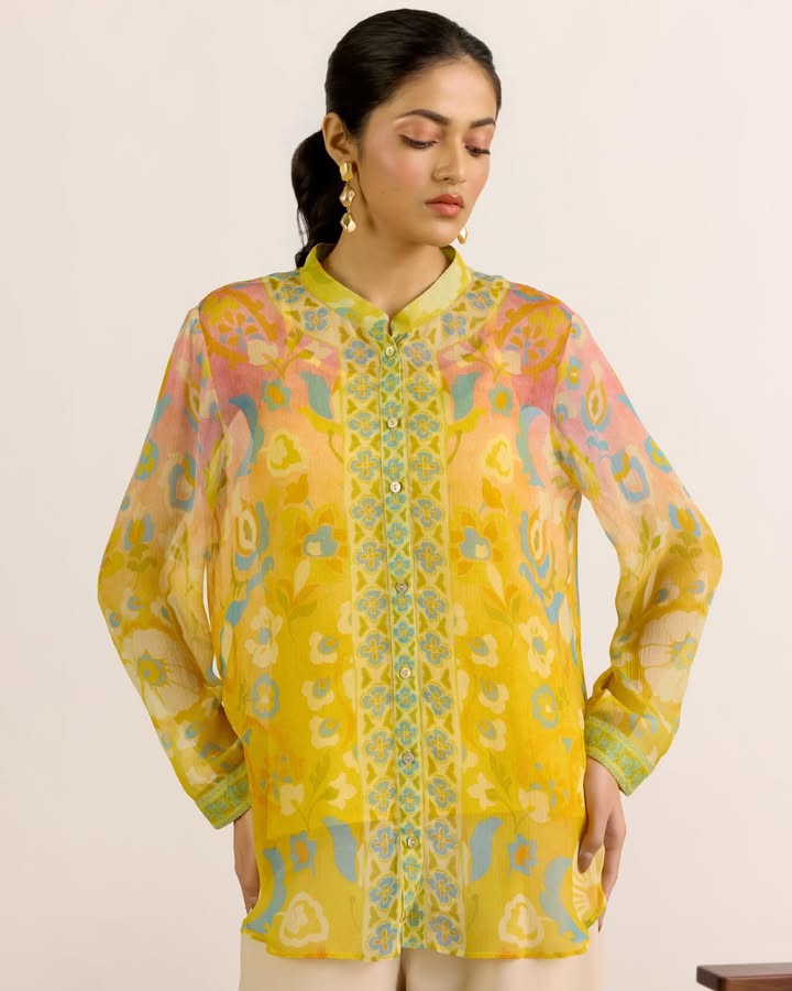 A wash of sunflower yellow with delicate florals effortless, airy and made to move with you