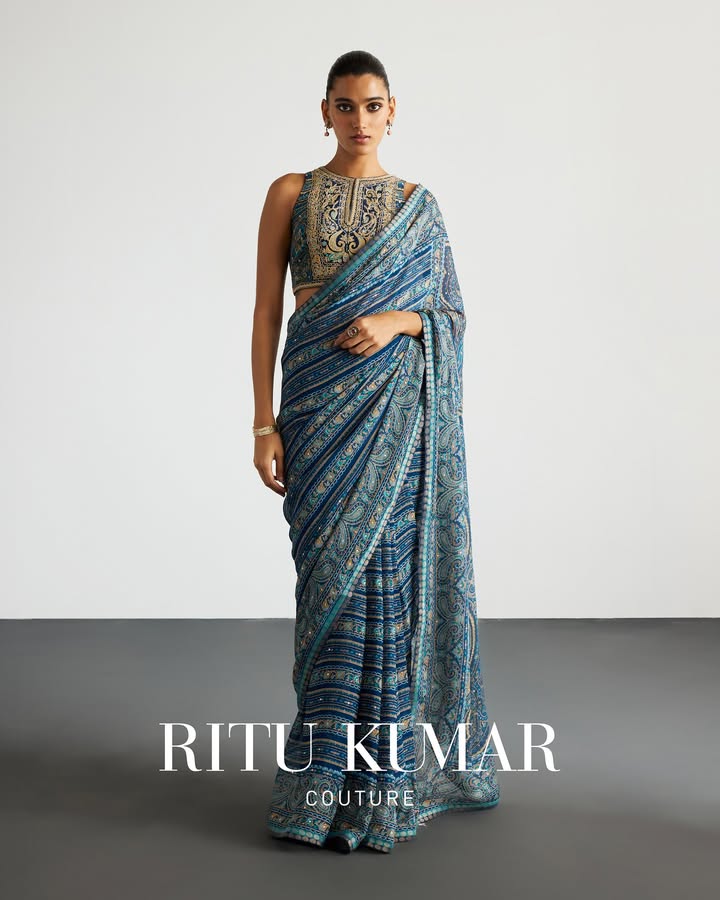 Easy silhouettes in the hue of a clear sky are embroidered with chikan work in delicate floral motifs