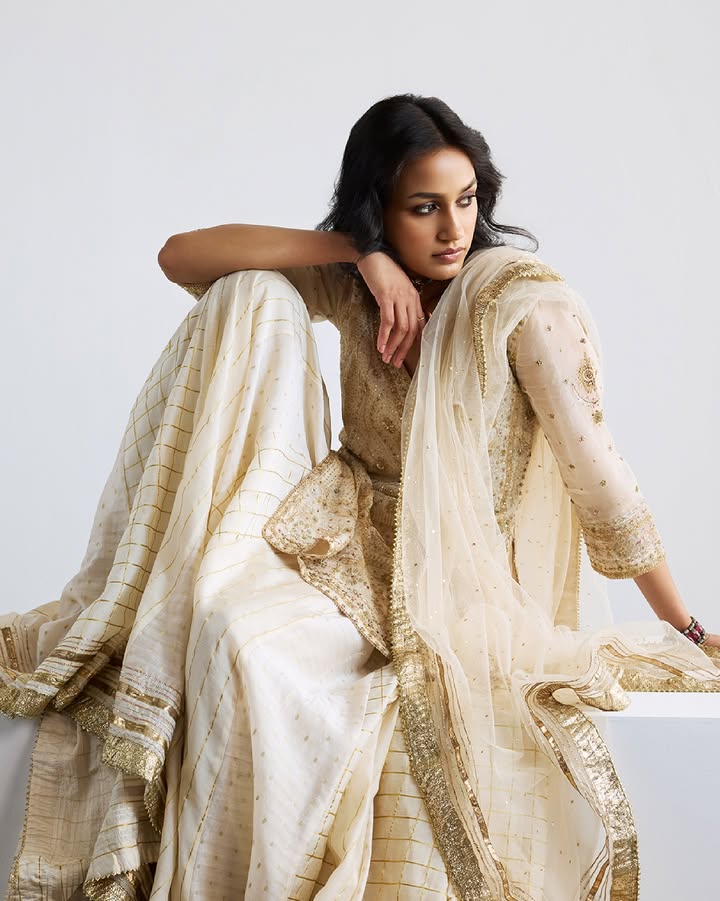 Embrace a state of timeless tranquility. Explore shades of white from Ritu Kumar Couture. Summer2025