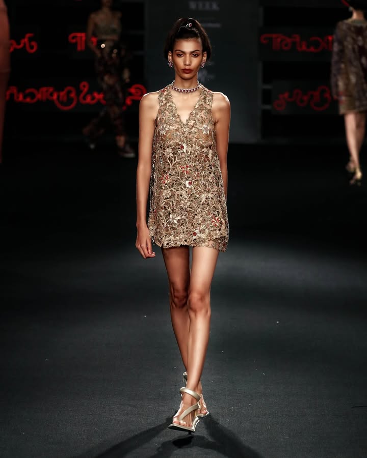 Delightfully delicate, this dress is an intricate labyrinth of intertwining strands of golden zardozi