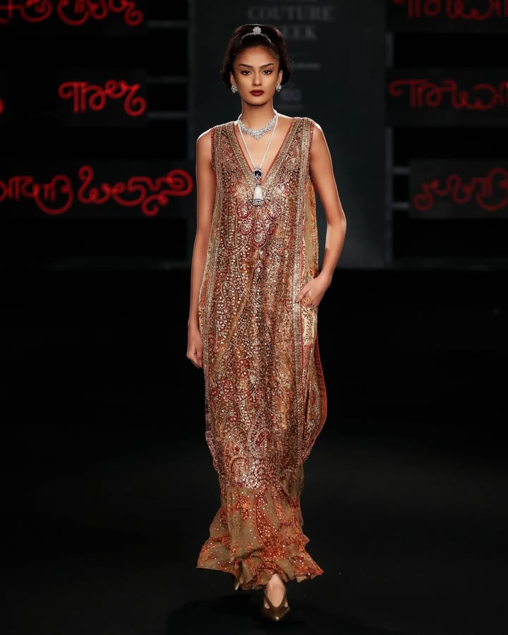 An archival print from the house of Ritu Kumar is revisited here on an organza dress