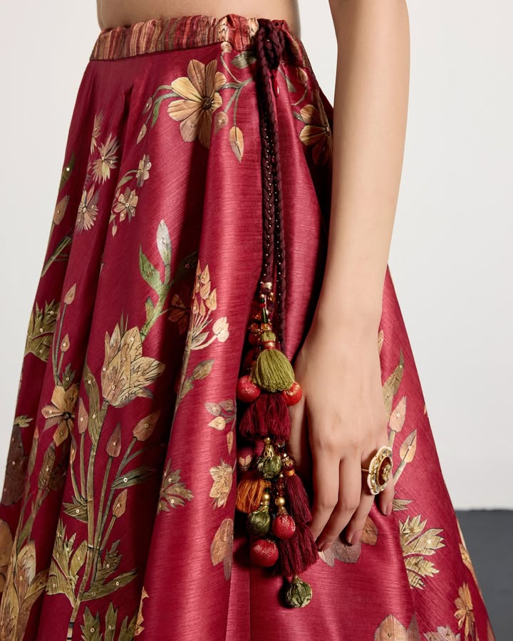Printed with florals inspired by Parisian wooden artworks, this lehenga brings together traditional embroidery with Assamese...