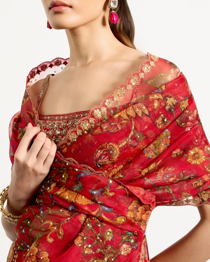 Motifs drawn from ancient block printed textiles adorn this saree from Ritu Kumar Couture