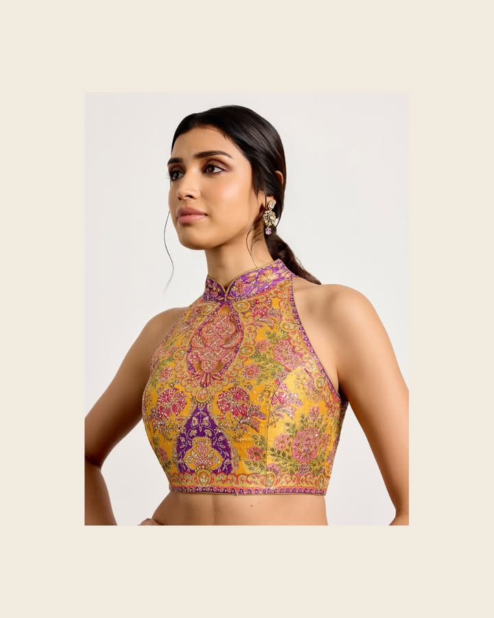 The Morina lehenga set from Ritu Kumar Couture is printed and embroidered with delicate florals in the hues of grapes and su...