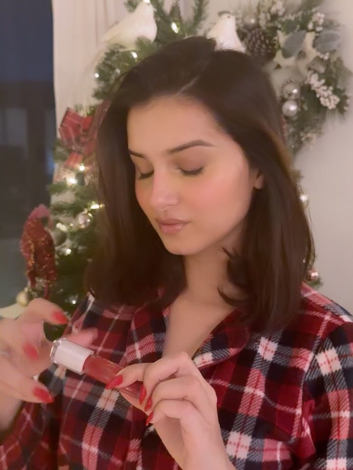 Proof that even Christmas PJs deserve a plump, glossy moment tarasutaria with the Extra Plump Lip Serum in Bare Raspber...