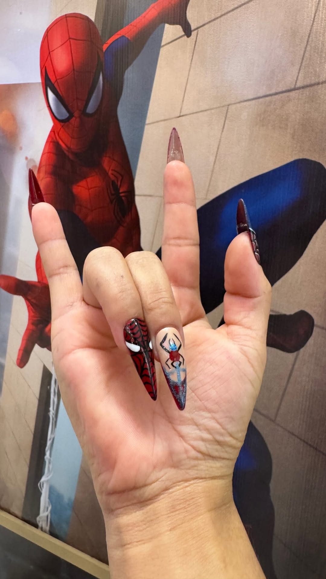  Spidey vibes, but make it nail art Bring your favourite superhero to your fingertips with this S...