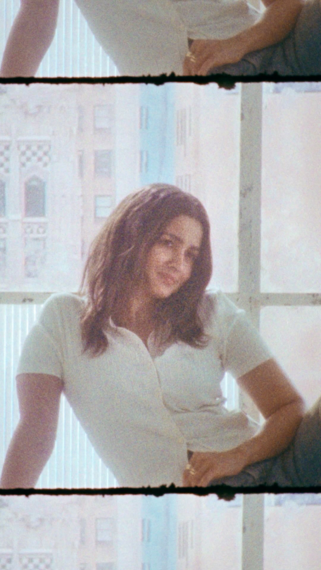 A white polo on aliaabhatt, finished with loose boot denim that opens up the silhouette.