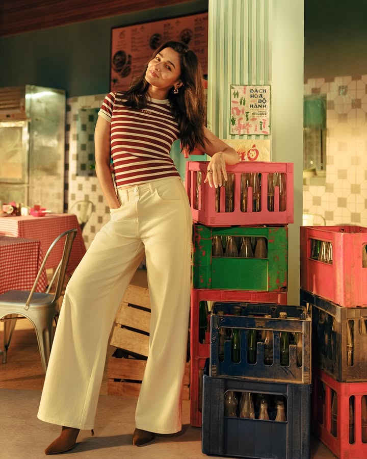 A cinched waist meets an easy, wide leg fit on lia bhatt , paired with a knit top