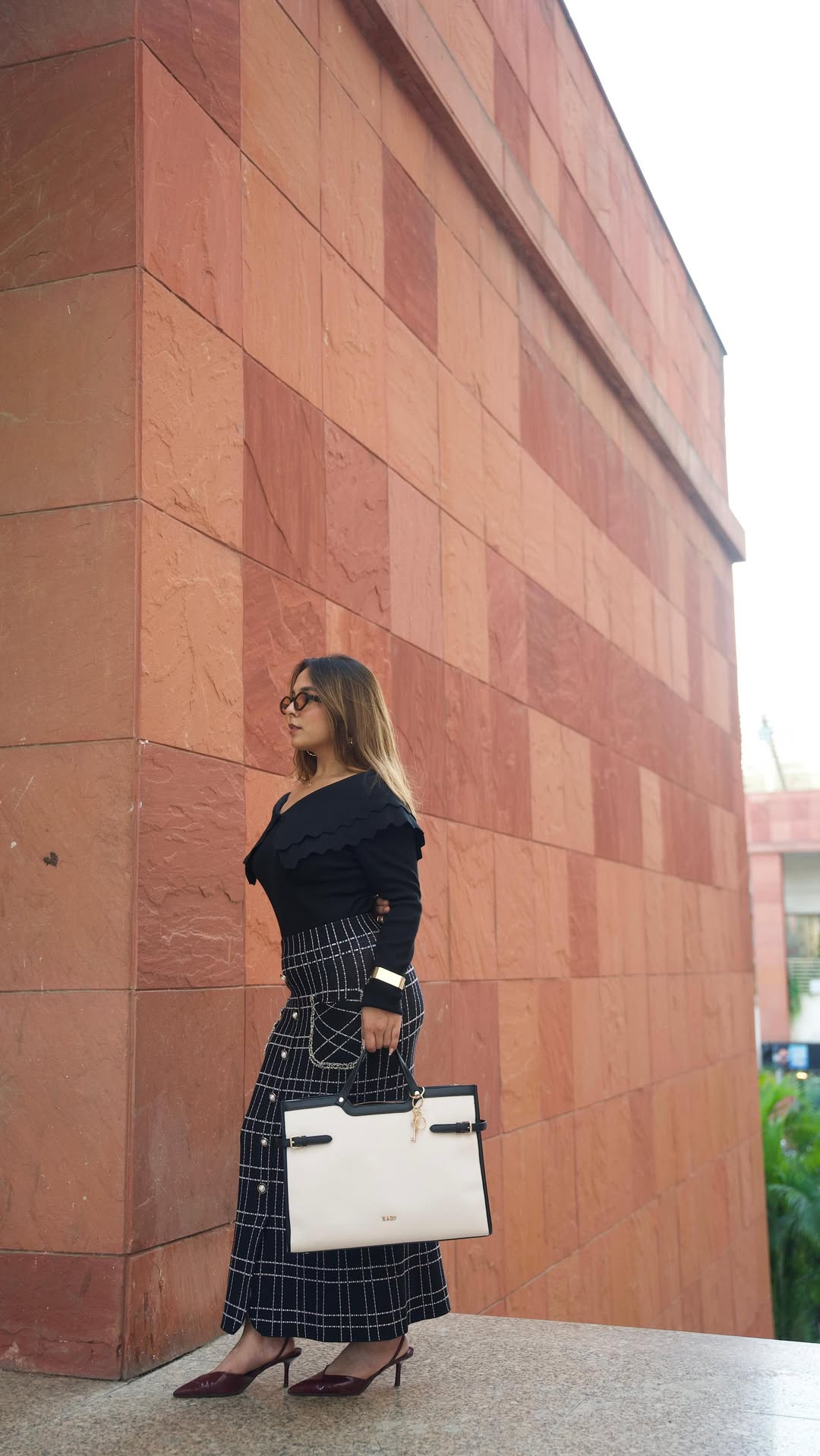 Walking through the city with all the spotlight on her Explore the new details online at www.kazo