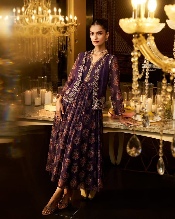 Wrapped in jewel tones and handcrafted charm, this look is ...