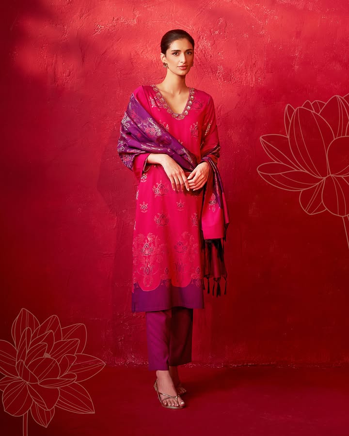 A celebration in every detail the neckline, the drape, the colour, the way it all comes together