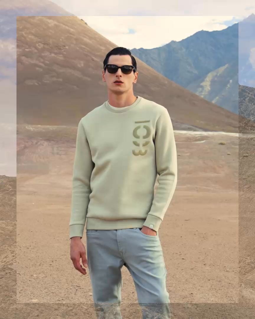 Graphic green layers with winter warmth Shop the look, wear it your way Mufti All Same Campaign, Mufti AW25, Tonal Green Ou...