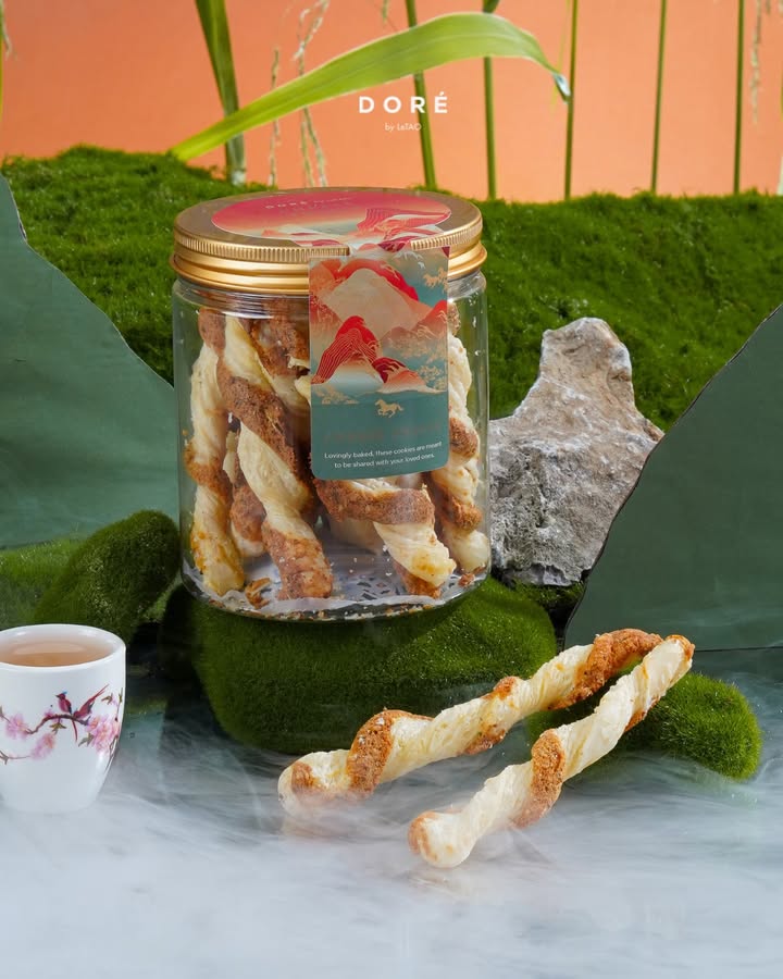 A prosperous twist this Lunar New Year Golden layers of cheese, baked to bring luck, joy, and togetherness to every ce...