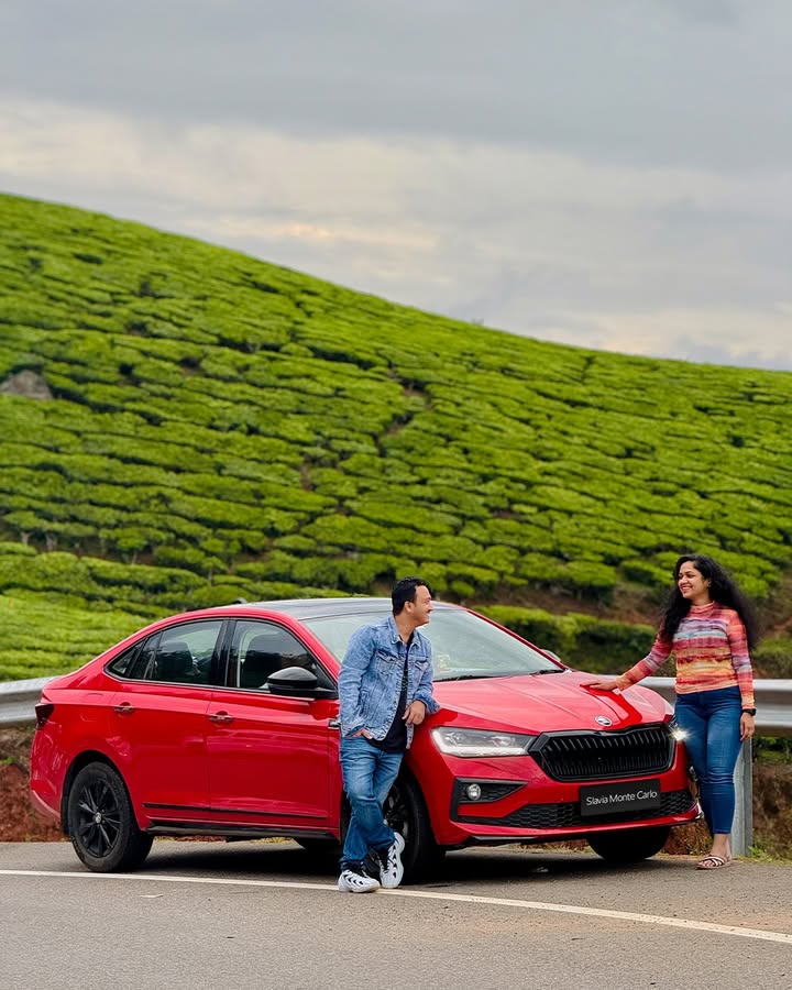 Pratish Jage and the koda Slavia taking in the tea scented breeze and winding charm of Munnar. A road trip wrapped in laughter, views, and picture perfect pauses Pratish Jage and the koda Slavia taking in the tea scented breeze and winding charm of Munnar
