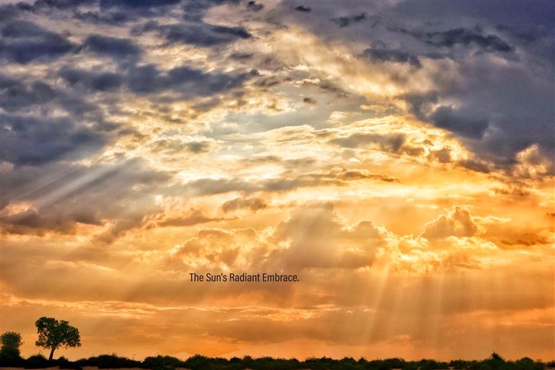 The sky ignites with a fiery brilliance, casting a golden glow across the landscape. Captured by Ramanathan Iyer